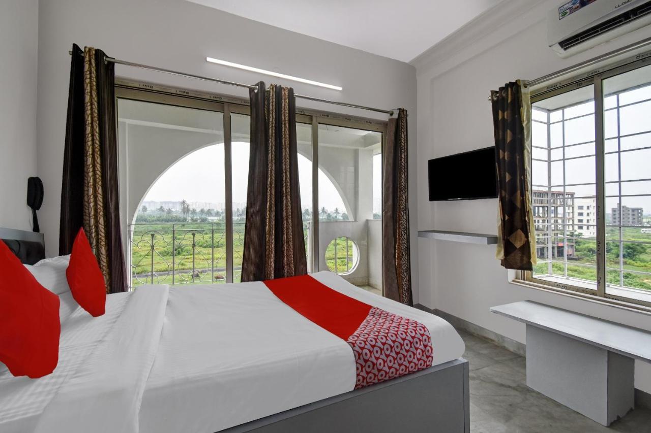 Super Hotel O J M T Upasana Калькутта Экстерьер фото