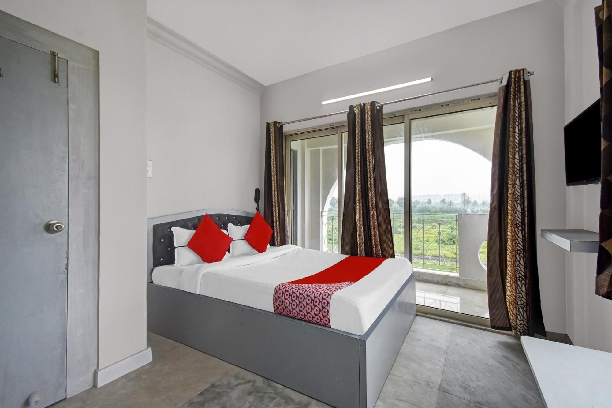 Super Hotel O J M T Upasana Калькутта Экстерьер фото